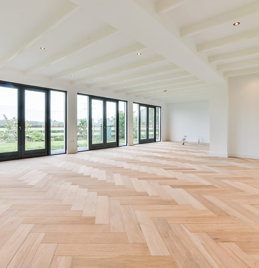 Bright spacious room with wood floor