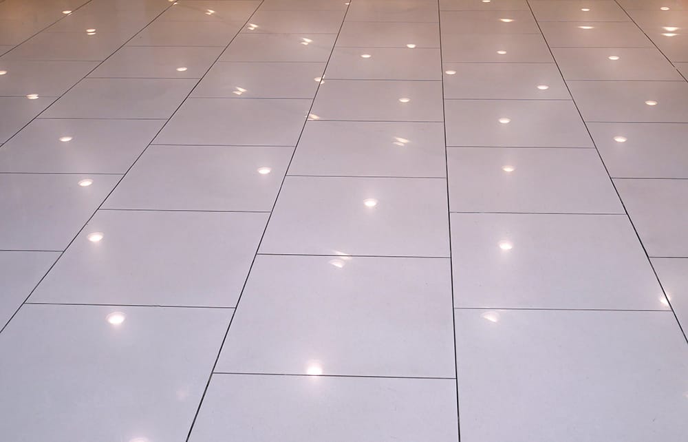 Glossy Tiled Floor with Lighting Reflection